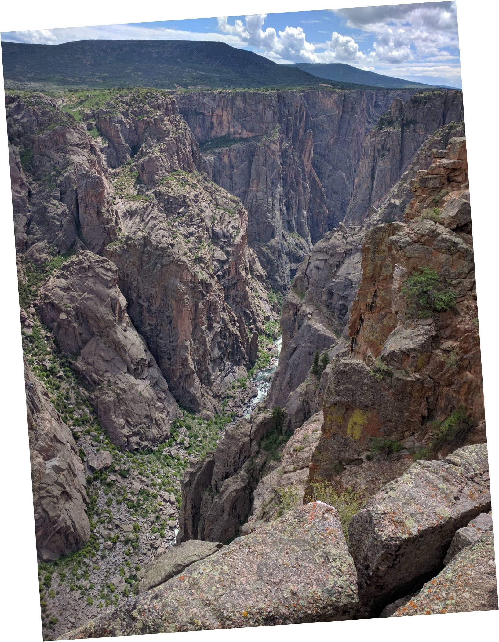 Image: A look into the depths of the Black Canyon from the Cross Fissures View
